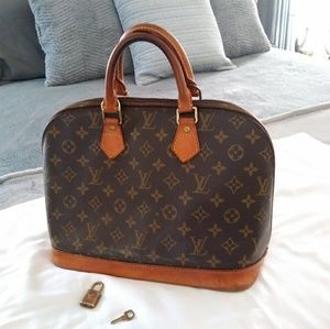 Louis Vuitton Neverfull Alma Handbag